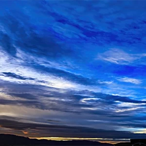 Morning Blue is a wall art print by OpusStuf showing a sunrise sky